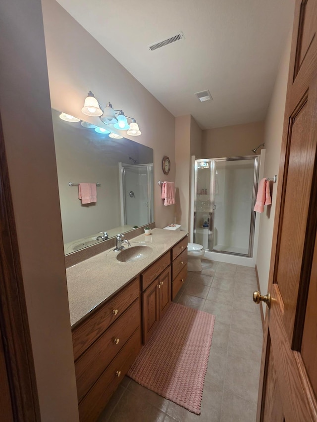1073 Harvest Way, Lake City, MN 55041 - bathroom featuring a shower stall, vanity, and tile patterned flooring