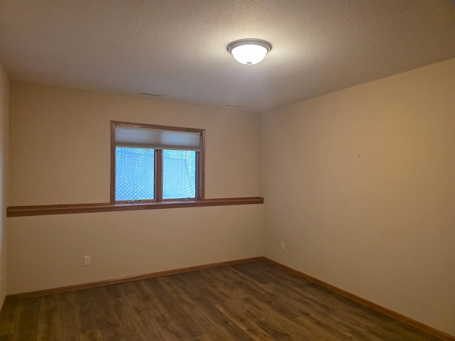 1073 Harvest Way, Lake City, MN 55041 - unfurnished room with wood finished floors and a textured ceiling