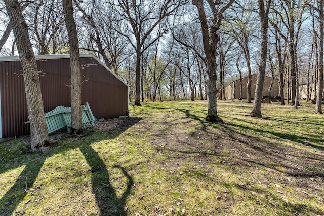37009 Blarney Beach Rd, Everts Twp, MN 56515 - view of grassy yard with an outbuilding and an outdoor structure