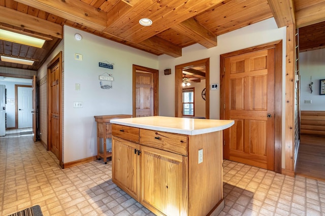 37009 Blarney Beach Rd, Everts Twp, MN 56515 - kitchen featuring brick patterned floors, baseboards, wood ceiling, light countertops, and a ceiling fan