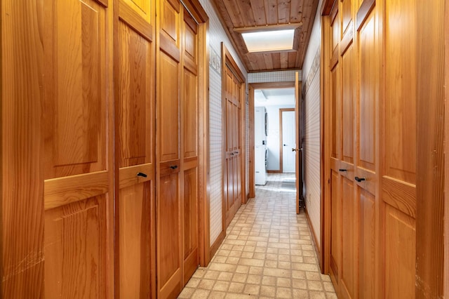 37009 Blarney Beach Rd, Everts Twp, MN 56515 - corridor with light flooring and wood walls