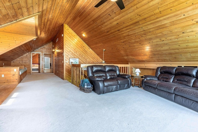 37009 Blarney Beach Rd, Everts Twp, MN 56515 - living room featuring ceiling fan, wood walls, lofted ceiling, carpet, and wood ceiling