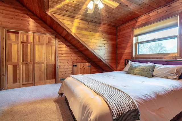 37009 Blarney Beach Rd, Everts Twp, MN 56515 - bedroom featuring wooden walls, carpet, wood ceiling, and a ceiling fan