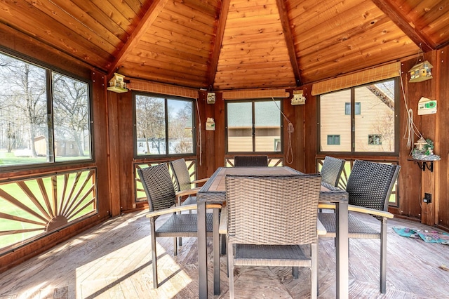37009 Blarney Beach Rd, Everts Twp, MN 56515 - sunroom / solarium with vaulted ceiling and outdoor dining space