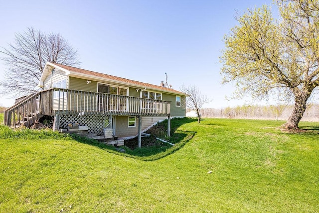 29618 110th Pl, Sturgeon Lake, MN 55783 - back of house with a deck and a lawn