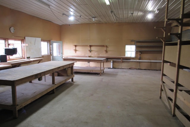 29618 110th Pl, Sturgeon Lake, MN 55783 - misc room with a workshop area, concrete flooring, and plenty of natural light