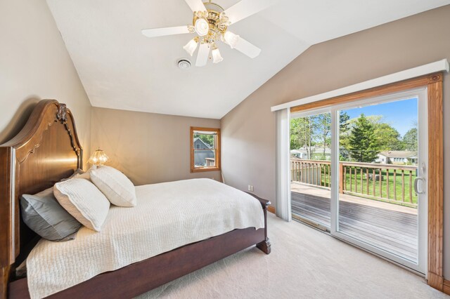 1112 4th St S, Stillwater, MN 55082 - bedroom featuring access to exterior, light colored carpet, lofted ceiling, baseboards, and ceiling fan