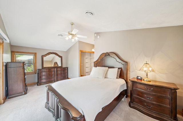 1112 4th St S, Stillwater, MN 55082 - bedroom featuring light colored carpet, vaulted ceiling, a ceiling fan, and baseboards
