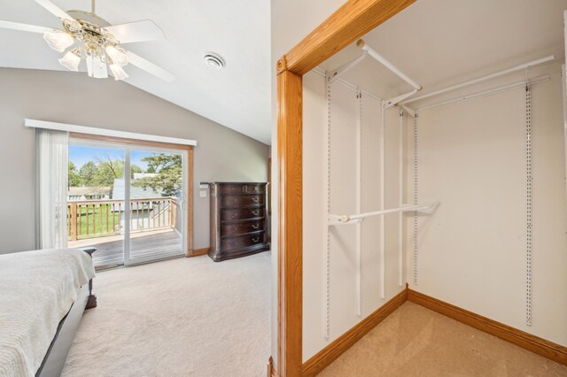 1112 4th St S, Stillwater, MN 55082 - bedroom with light carpet, access to outside, lofted ceiling, baseboards, and ceiling fan
