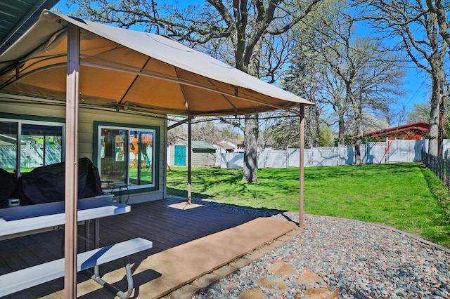 view of patio / terrace with a deck and a gazebo