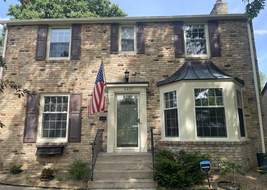 view of front of property with a chimney