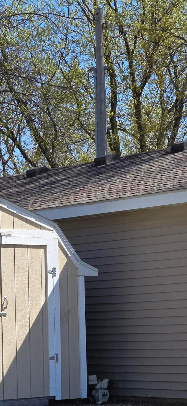 exterior view of roof with shingles