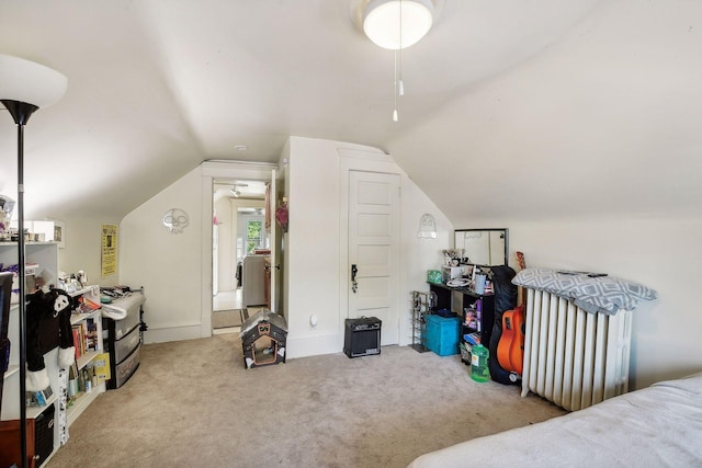 bonus room featuring carpet flooring and vaulted ceiling