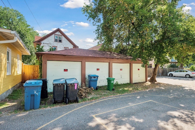 garage with fence