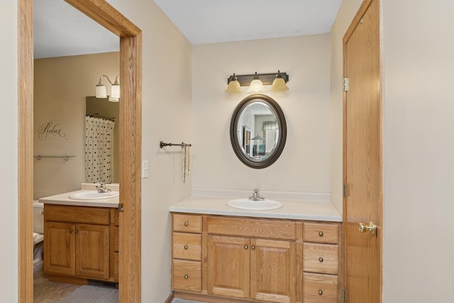 bathroom featuring two vanities
