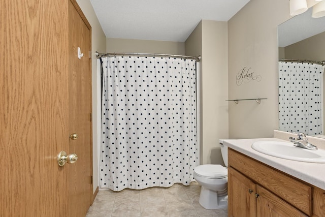 full bath with tile patterned flooring, toilet, vanity, and a shower with shower curtain