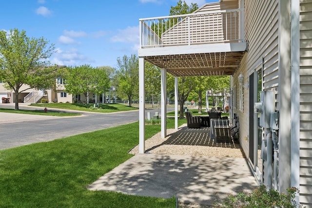 view of patio / terrace with a balcony