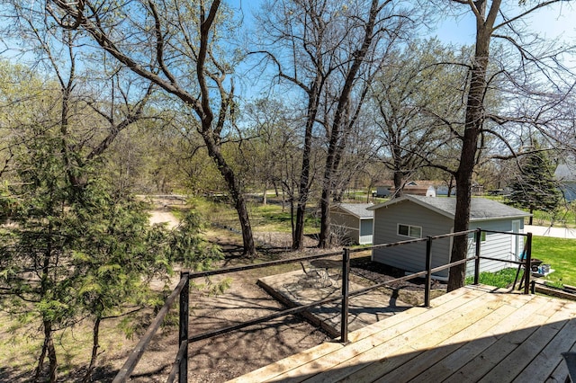 23711 Clarissa Haven Dr, Girard Twp, MN 56551 - wooden deck featuring an outdoor structure
