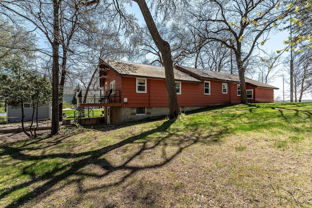 23711 Clarissa Haven Dr, Girard Twp, MN 56551 - view of property exterior with a deck, a yard, and stairway