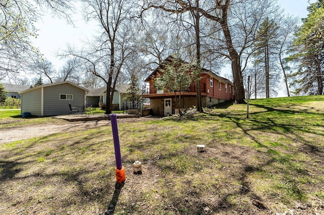 23711 Clarissa Haven Dr, Girard Twp, MN 56551 - view of green lawn with a wooden deck