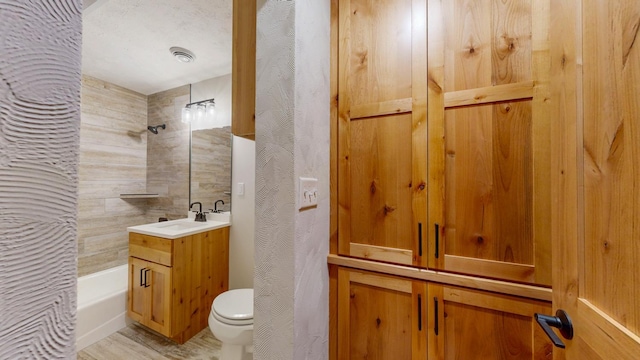 bathroom with toilet, vanity, and shower / tub combo with curtain
