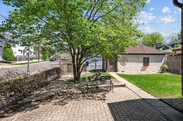 view of patio / terrace featuring fence