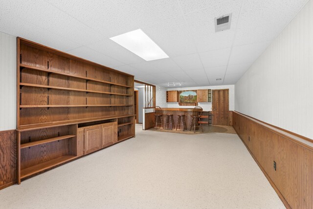 38546 Grand Ave, North Branch, MN 55056 - unfurnished office featuring wooden walls, wainscoting, and bar area
