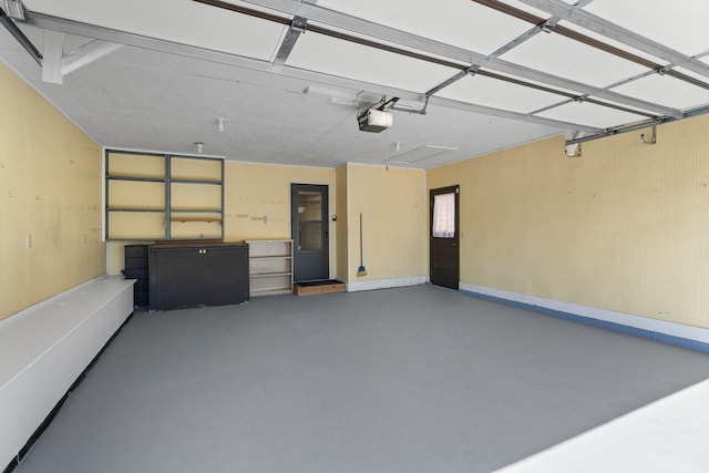 38546 Grand Ave, North Branch, MN 55056 - garage featuring a garage door opener