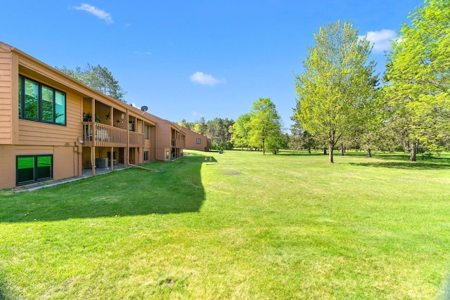 38546 Grand Ave, North Branch, MN 55056 - view of grassy yard with central AC