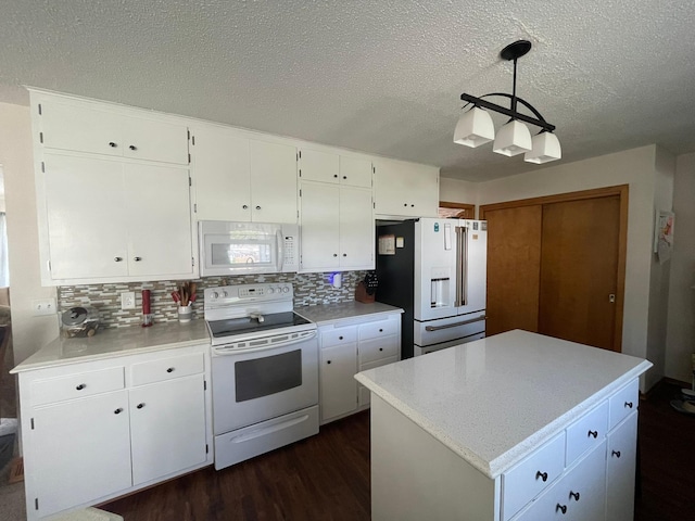 112 Walnut St, Dawson, MN 56232 - kitchen with white appliances, a textured ceiling, dark wood-style flooring, white cabinetry, and backsplash