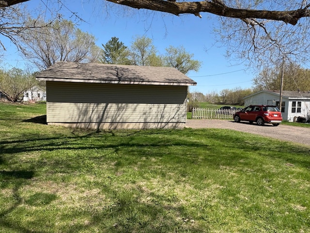 307 Deerwood Ln S, Onamia, MN 56359 - view of side of home featuring driveway
