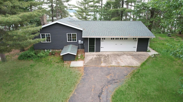 2202 Pine View Blvd, Motley, MN 56466 - view of front of property featuring asphalt driveway, an attached garage, and a shingled roof