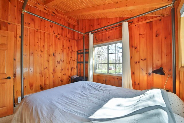 2202 Pine View Blvd, Motley, MN 56466 - bedroom with a wooden ceiling with exposed beams and wood walls