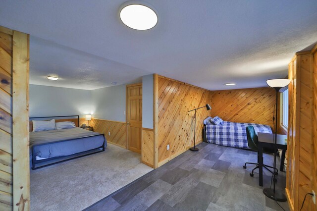 2202 Pine View Blvd, Motley, MN 56466 - bedroom featuring wooden walls and carpet floors