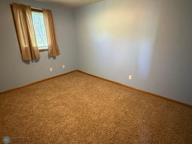 408 Np Ct, Breckenridge, MN 56520 - empty room featuring carpet flooring and baseboards