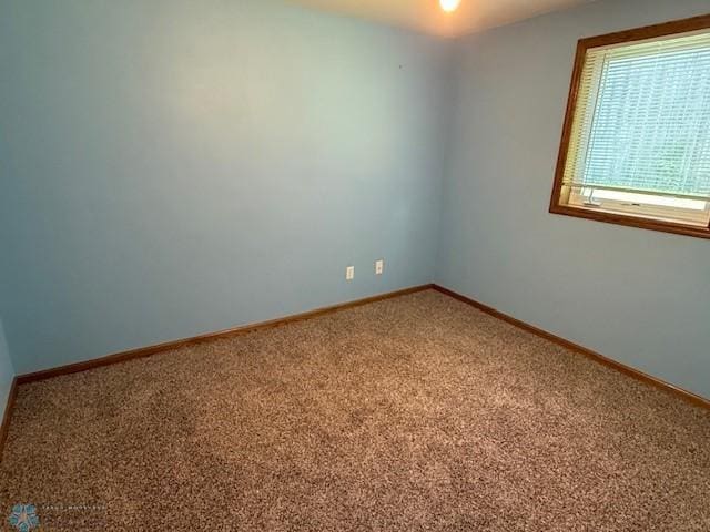 408 Np Ct, Breckenridge, MN 56520 - empty room with carpet and baseboards