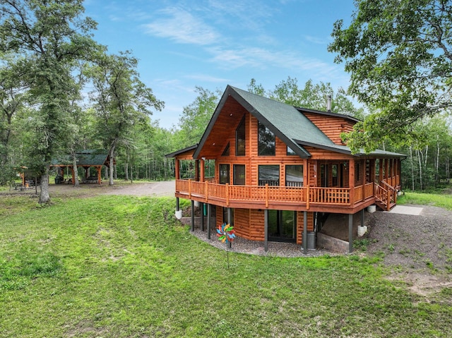29917 Bay Dr, Danbury, WI 54830 - rear view of house with a yard and a wooden deck