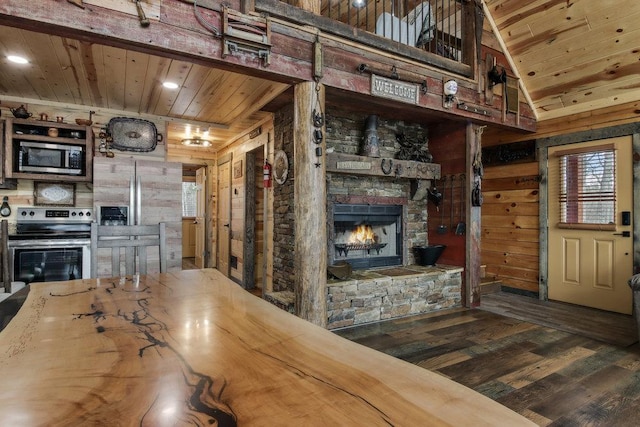 29917 Bay Dr, Danbury, WI 54830 - living area with wood ceiling, wood finished floors, a fireplace, wooden walls, and recessed lighting