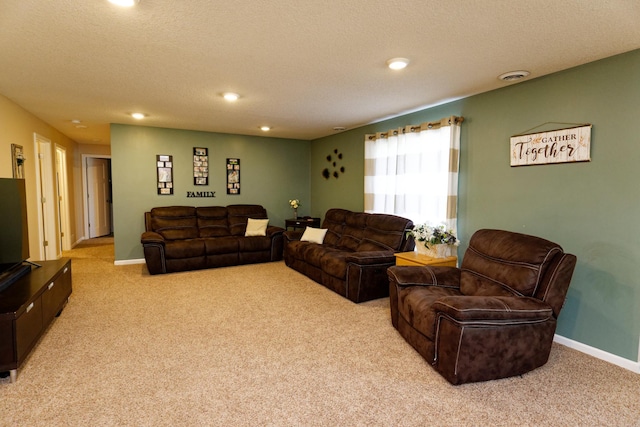 11372 75th St NE, Otsego, MN 55301 - living area featuring light colored carpet, a textured ceiling, baseboards, and recessed lighting