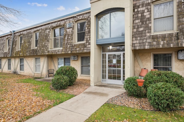 923 11th Ave S Unit 8, Hopkins, MN 55343 - view of property featuring a wall unit AC