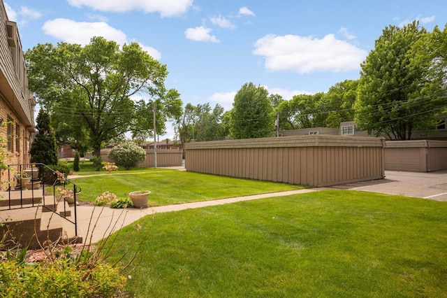 1494 21st Ave NW Unit 4, New Brighton, MN 55112 - view of yard with a patio
