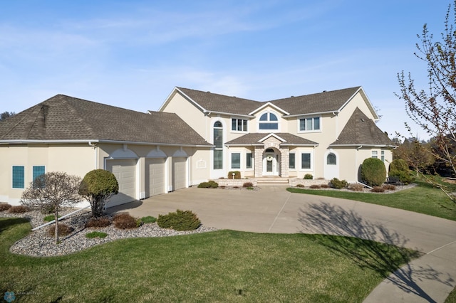 4126 Timberline Dr S, Fargo, ND 58104 - traditional-style house with concrete driveway, an attached garage, stucco siding, and a front yard