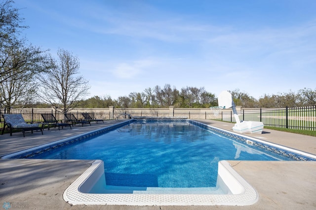 4126 Timberline Dr S, Fargo, ND 58104 - view of swimming pool featuring a fenced backyard and a patio