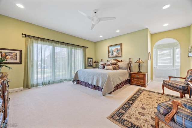 4126 Timberline Dr S, Fargo, ND 58104 - bedroom featuring light colored carpet, baseboards, multiple windows, recessed lighting, and ceiling fan
