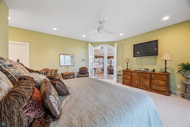 4126 Timberline Dr S, Fargo, ND 58104 - carpeted bedroom with arched walkways, recessed lighting, and a ceiling fan