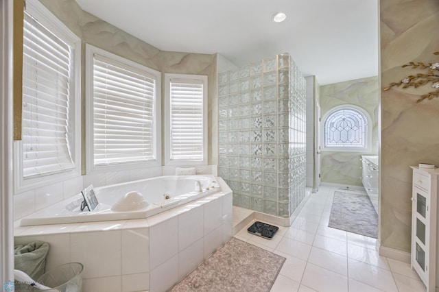 4126 Timberline Dr S, Fargo, ND 58104 - full bathroom featuring walk in shower, a bath, tile patterned floors, and vanity