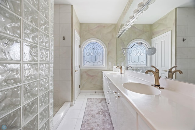 4126 Timberline Dr S, Fargo, ND 58104 - full bath with tile patterned flooring, double vanity, and walk in shower
