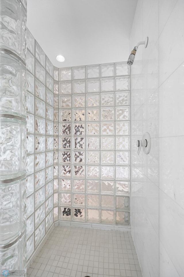 4126 Timberline Dr S, Fargo, ND 58104 - bathroom with a tile shower and tile patterned floors