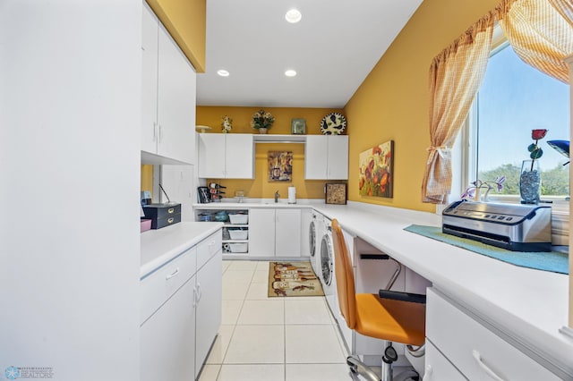 4126 Timberline Dr S, Fargo, ND 58104 - kitchen with light countertops, white cabinetry, light tile patterned flooring, recessed lighting, and a sink