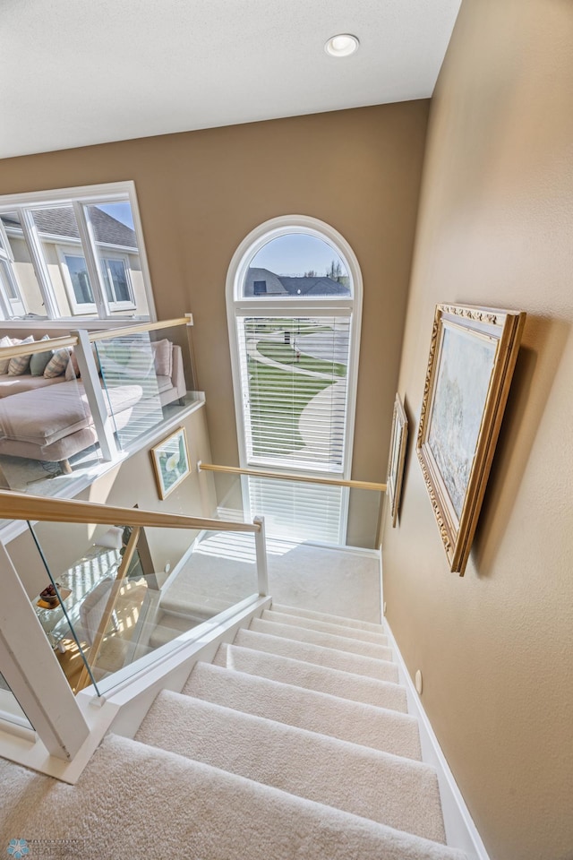 4126 Timberline Dr S, Fargo, ND 58104 - staircase with baseboards, carpet flooring, and recessed lighting